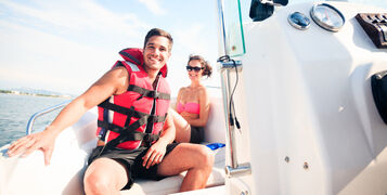 Young,Couple,On,Boat